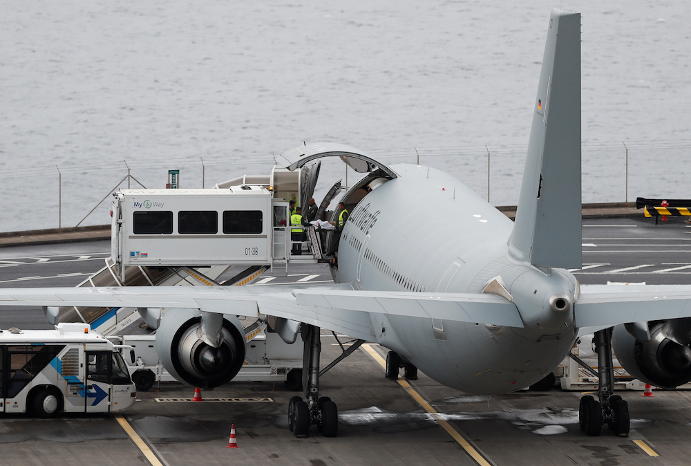 An injured German tourist involved in a bus accident is helped onto a German Air Force medical airplane at Cristiano Ronaldo Airport in Funchal, on the island of Madeira, Portugal April 20, 2019. u00e2u20acu201d Reuters pic