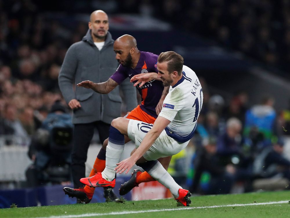 Tottenhamu00e2u20acu2122s Harry Kane in action with Manchester Cityu00e2u20acu2122s Fabian Delph before sustaining an injury during their Champions League Quarter Final First Leg match at Tottenham Hotspur Stadium in London, April 9, 2019. u00e2u20acu201d Action Images pic via Reuters