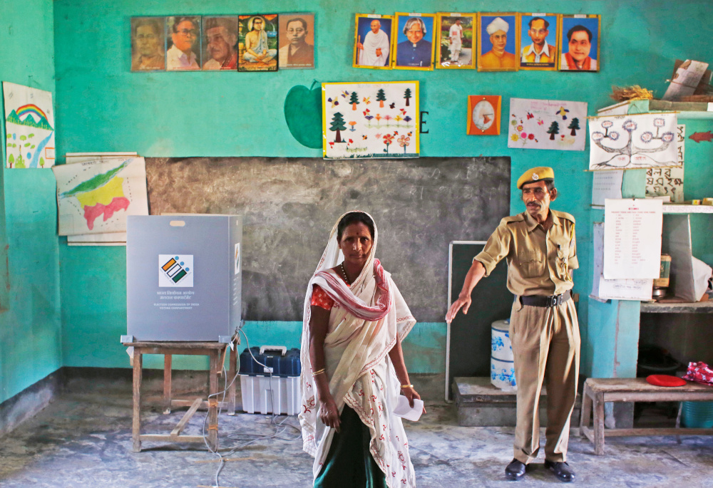 A woman leaves after casting her vote at a polling station during the first phase of general election in Majuli, a river island in the Brahmaputra river, northeastern Indian state of Assam, India April 11, 2019. u00e2u20acu201d Reuters pic