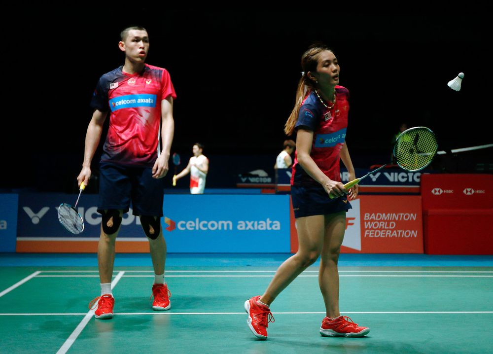 Malaysiau00e2u20acu2122s mixed doubles players Tan Kian Meng (left) and Lai Pei Jing (right) in action in the semi-finals of the Celcom Axiata 2019 Open at the Axiata Arena in Bukit Jalil April 6, 2019. u00e2u20acu201d Bernama pic