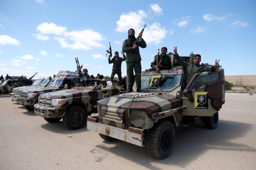 Libyan National Army members, commanded by Khalifa Haftar, pose for a picture as they head out of Benghazi to reinforce the troops advancing to Tripoli, in Benghazi, Libya April 7, 2019. u00e2u20acu201d Reuters pic  