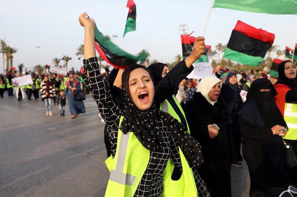 Libyan protesters attend a demonstration to demand an end to the Khalifa Haftaru00e2u20acu2122s offensive against Tripoli, in Martyrsu00e2u20acu2122 Square in central Tripoli,Libya April 19, 2019. u00e2u20acu201d Reuters picnnn