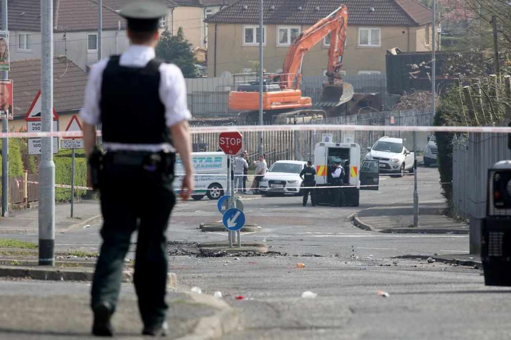 Police secure the area where a journalist was fatally shot amid rioting overnight in the Creggan area of Derry (Londonderry) on April 19, 2019. Journalist Lyra McKee was shot dead overnight during riots in the Creggan area of Derry, u00e2u20acu201d AFP pic