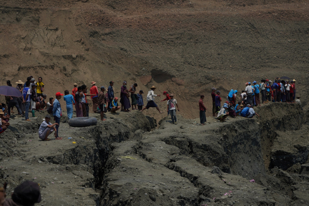 Local people look on in a jade mine where the mud dam collapsed in Hpakant, Kachin state, Myanmar April 23, 2019. u00e2u20acu201d Reuters pic 