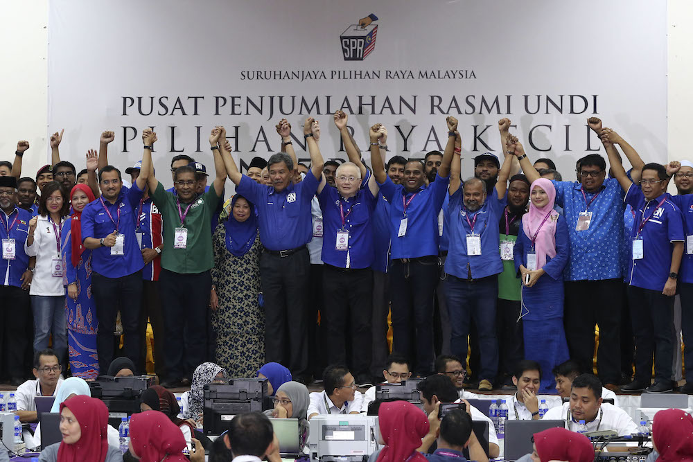 Barisan Nasional candidate Datuk Seri Mohamad Hasan with leaders from BN and PAS leaders after winning the Rantau by-election April 13, 2019. u00e2u20acu201d Mohd Yusof Mat Isa