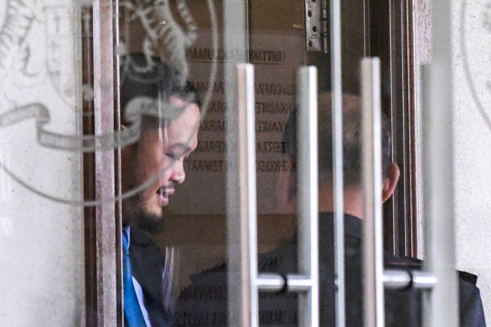 Bank Negara Malaysia officer Mohammad Nizam Yahya is pictured at the Kuala Lumpur Court Complex April 16, 2019. u00e2u20acu201d Picture by Hari Anggara