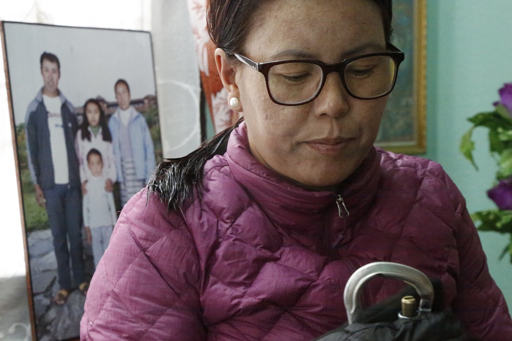 Furdiki Sherpa, one of the two Nepali widows attempting to summit Mount Everest, fixes a carabiner at her home in Kathmandu, Nepal April 6, 2019. u00e2u20acu201d Thomson Reuters Foundation pic
