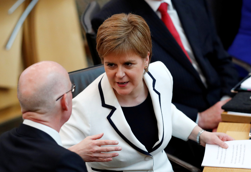 Scotlandu00e2u20acu2122s First Minister Nicola Sturgeon chats before speaking in the Scottish Parliament during continued Brexit uncertainty in Edinburgh, Scotland, Britain, April 24, 2019. u00e2u20acu201d Reuters pic 