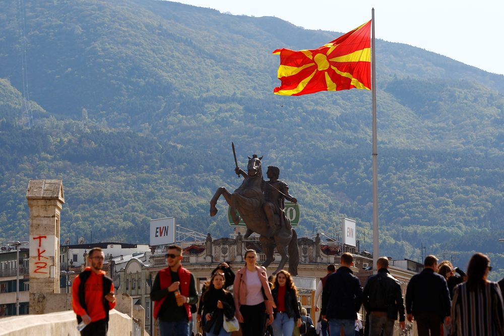 People pass over the stone bridge in Skopje, North Macedonia, April 19, 2019. u00e2u20acu201d Reuters pic