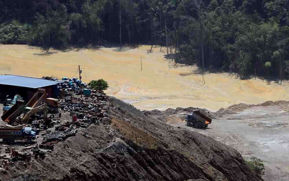 The discharge water from the processing plant are placed in tailing ponds, which traps the waste.