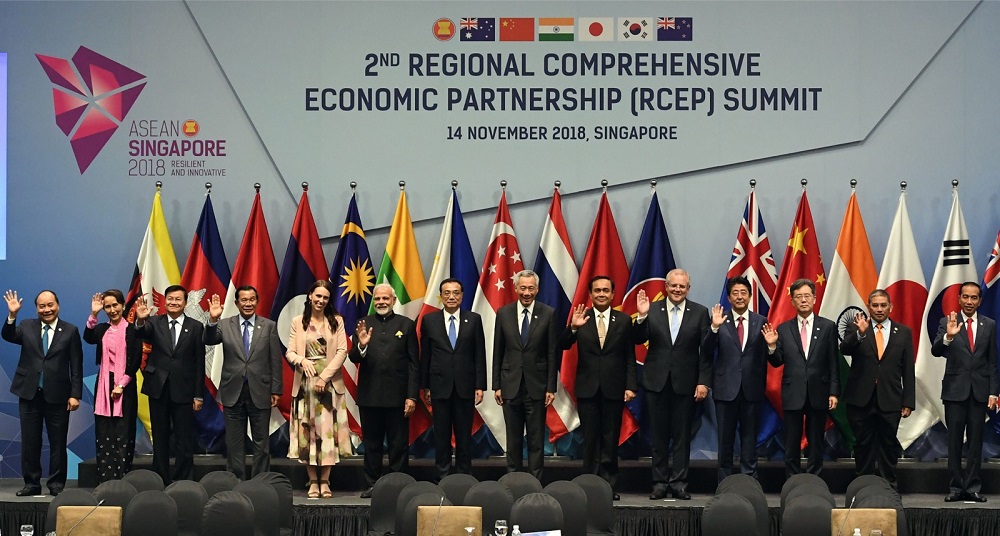 Leaders and representatives pose for a group photo during the 2nd Regional Comprehensive Economic Partnership summit on the sidelines of the 33rd Asean Summit in Singapore November 14, 2018. — AFP pic