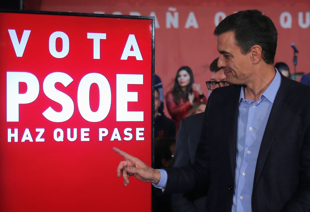 Spainu00e2u20acu2122s Socialist leader and current Prime Minister Pedro Sanchez points to the screen as they kick off their election campaign in Dos Hermanas, near Seville, April 12, 2019. u00e2u20acu201d Reuters pic