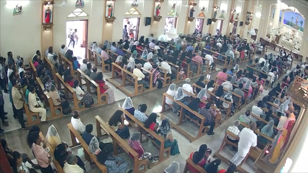 A suspected suicide bomber enters St Sebastianu00e2u20acu2122s Church in Negombo, Sri Lanka April 21, 2019 in this still image taken from a CCTV handout footage of Easter Sunday attacks released on April 23, 2019. u00e2u20acu201d CCTV/Siyatha News handout pic via Reuters