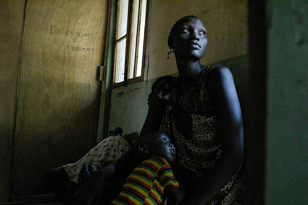 A mother and her sick son wait for treatment at the Udier primary health and care centre supported by the International Committee of the Red Cross (ICRC) in Udier, in the Upper Nile region March 7, 2019. u00e2u20acu201d AFP pic  