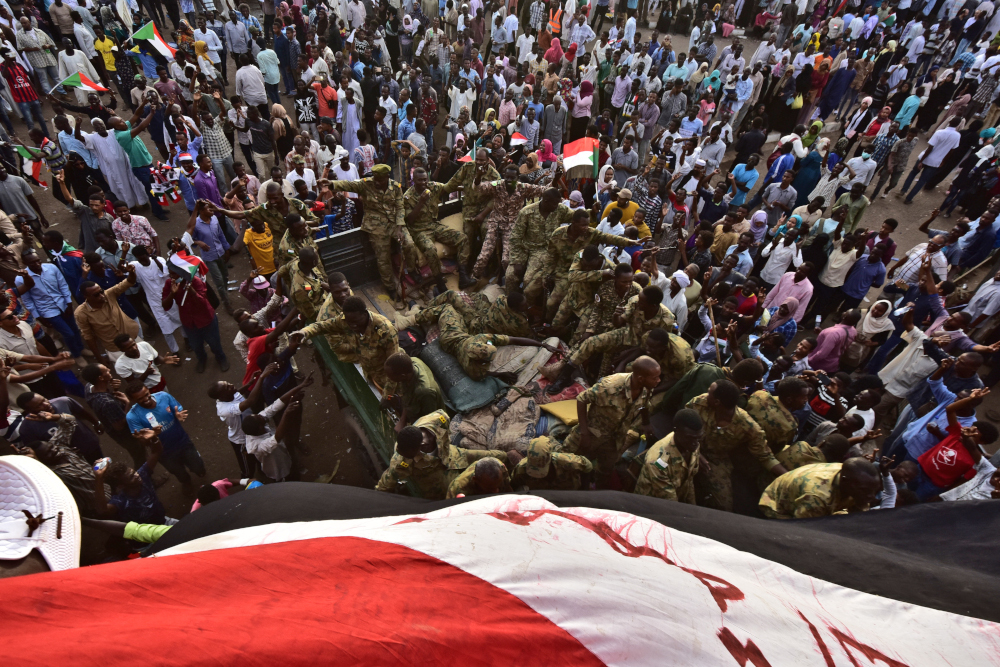 Sudanese demonstrators gather near the military headquarters in the capital Khartoum April 14, 2019. u00e2u20acu201d AFP pic nn