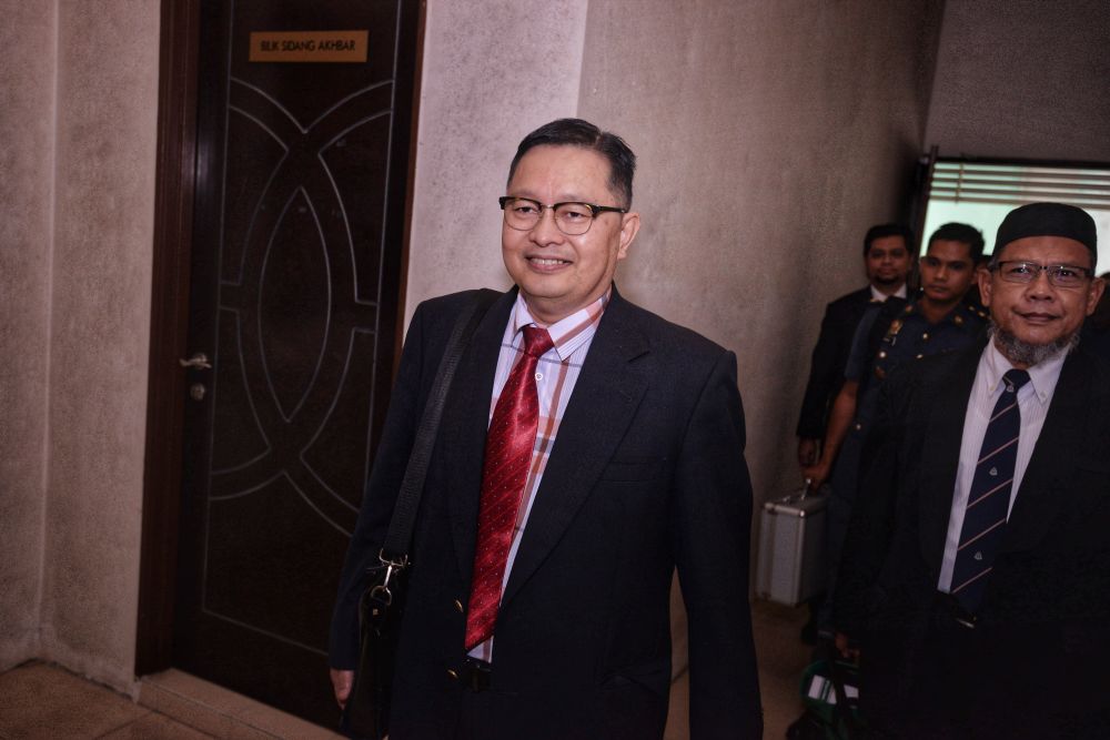 Prof Dr Shahrom Abd Wahid leaves after attending the inquest into fireman Muhammad Adib Mohd Kassimu00e2u20acu2122s death at the Shah Alam High Court April 9, 2019. u00e2u20acu201d Picture by Shafwan Zaidon