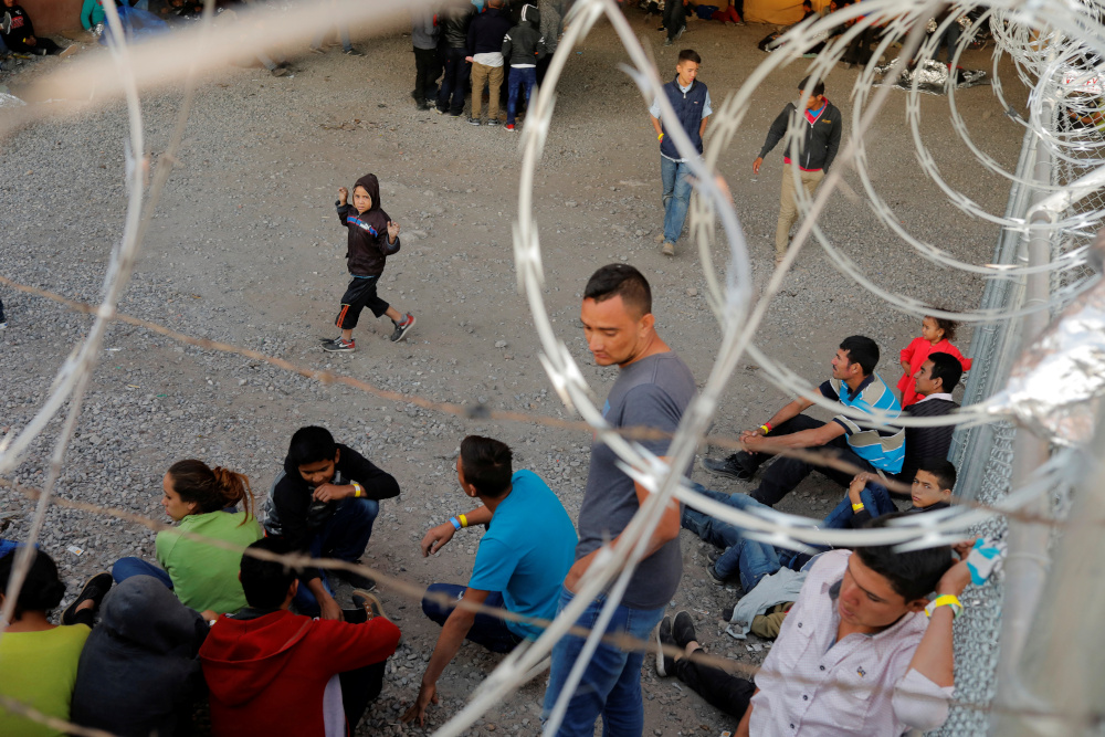 Migrants from Central America wait inside of an enclosure where they are being held by US Customs and Border Protection in El Paso, Texas, US, March 29, 2019. u00e2u20acu201d Reuters pic 