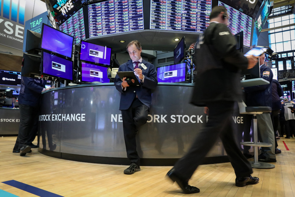 Traders work on the floor at the New York Stock Exchange (NYSE) in New York, US, April 23, 2019. u00e2u20acu201d Reuters pic