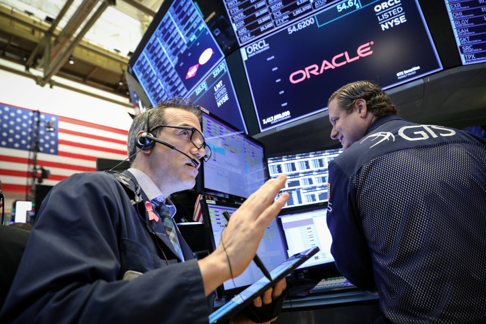 Traders work on the floor at the New York Stock Exchange (NYSE) in New York, US, April 23, 2019. u00e2u20acu201d Reuters pic
