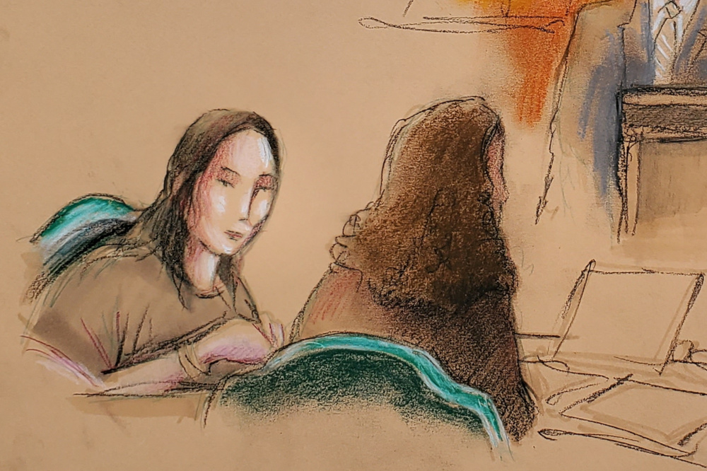 Yujing Zhang (left), charged with bluffing her way into President Donald Trump's Florida resort, appears at her hearing at the US federal court in this courtroom sketch, in West Palm Beach, Florida, US, April 8, 2019. u00e2u20acu201d Reuters pic