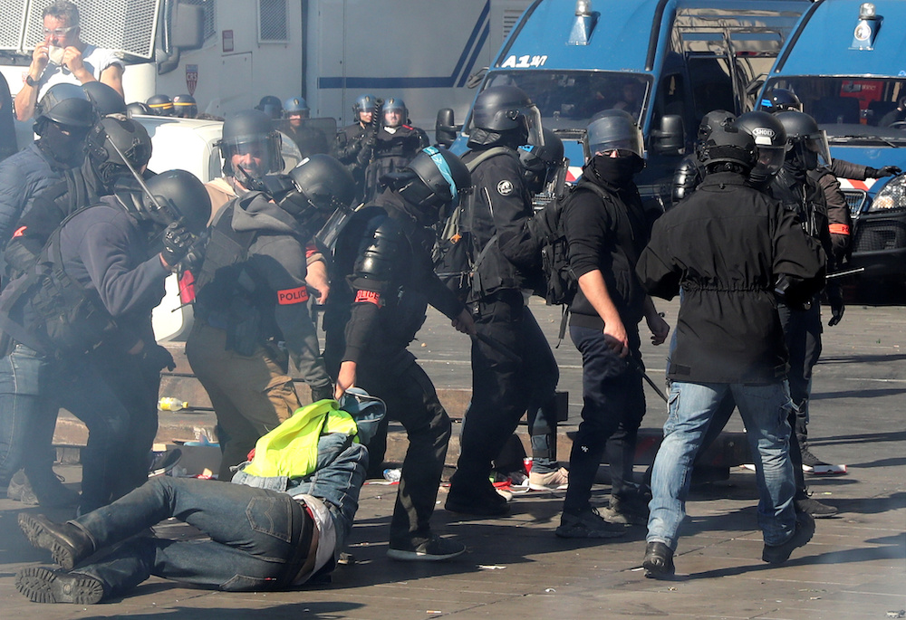 Riot police drag a protester during a demonstration on Act XXIII (the 23rd consecutive national protest on Saturday) of the yellow vests movement inParis, France, April 20, 2019. u00e2u20acu201d Reuters pic