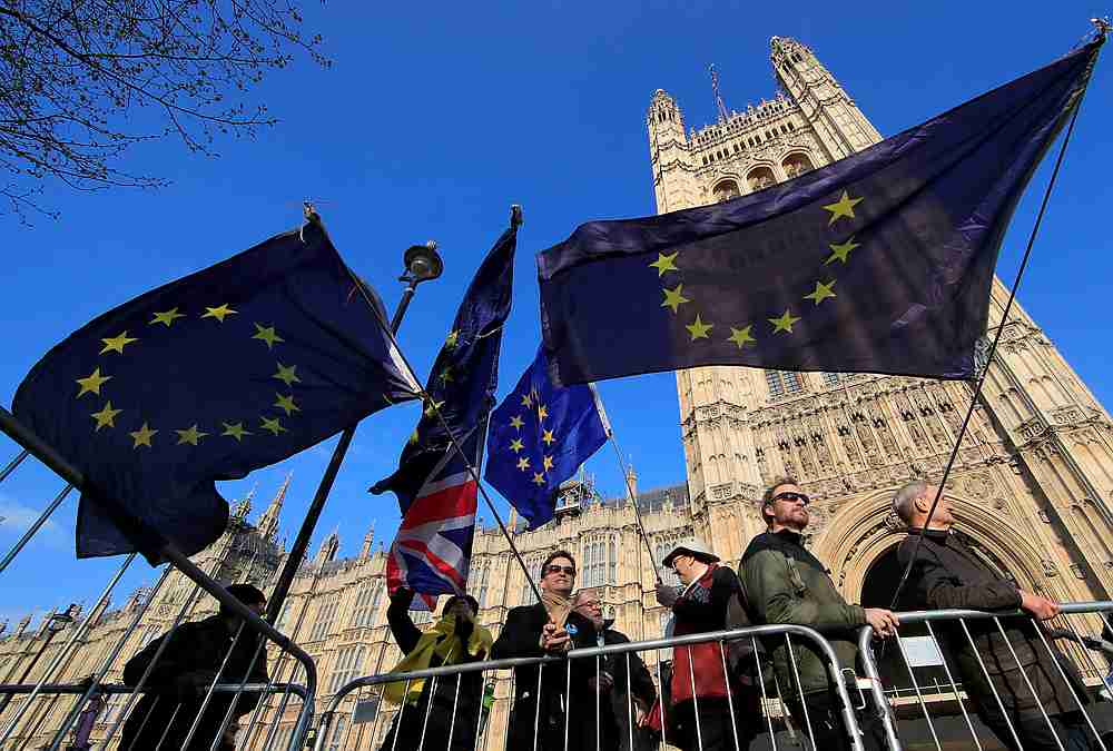 Anti-Brexit protesters hold EU flags as they demonstrate outside the Houses of Parliament, as uncertainty over Brexit continues, in London April 11, 2019. u00e2u20acu201d Reuters pic