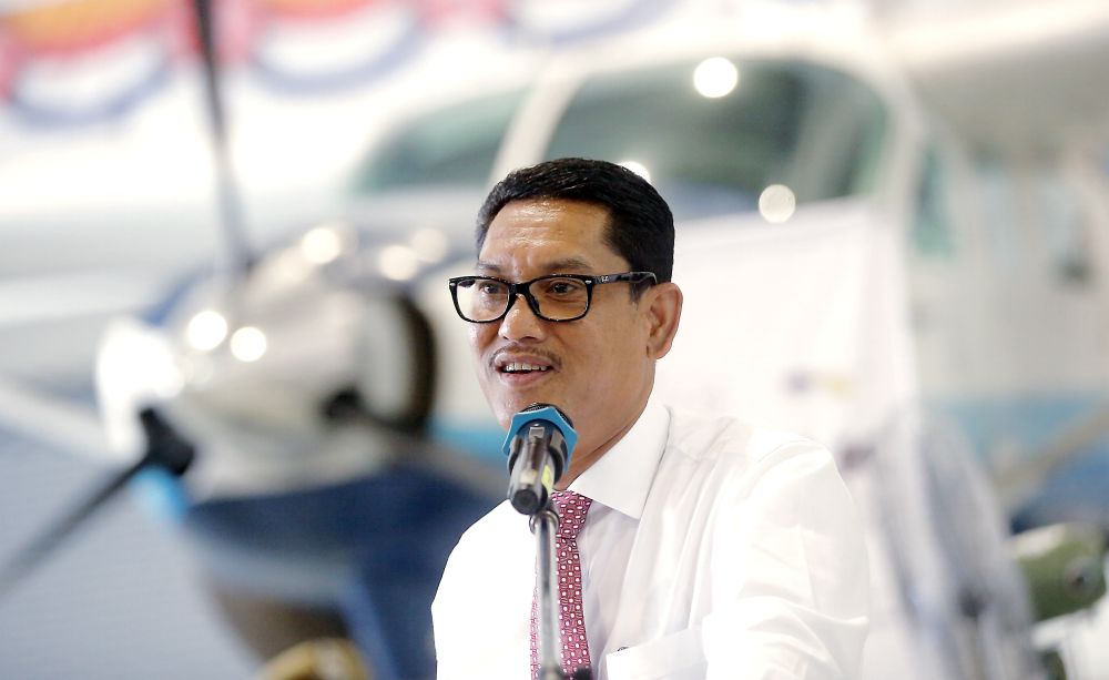 Perak Mentri Besar Datuk Seri Ahmad Faizal Azumu speaks after launching the Perak International Skydiving Championship at the police aviation training centre in Ipoh April 16, 2019. — Picture by Farhan Najib