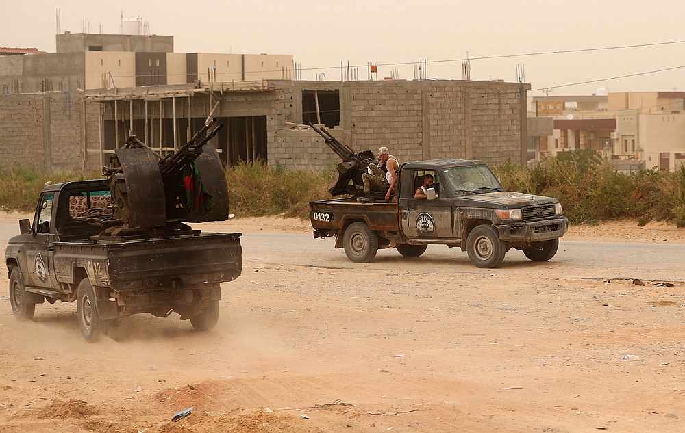 Members of the the Libyan internationally recognised government forces take position during the fighting with the Eastern forces in Ain Zara, in Tripoli April 21, 2019. u00e2u20acu201d Reuters pic