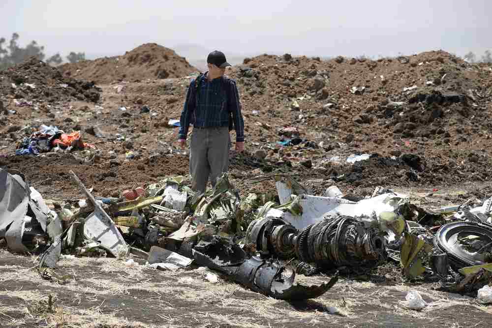 American civil aviation and Boeing investigators search through the debris at the scene of the Ethiopian Airlines Flight ET 302 plane crash, near the town of Bishoftu, south-east of Addis Ababa, Ethiopia March 12, 2019. u00e2u20acu201d Reuters pic
