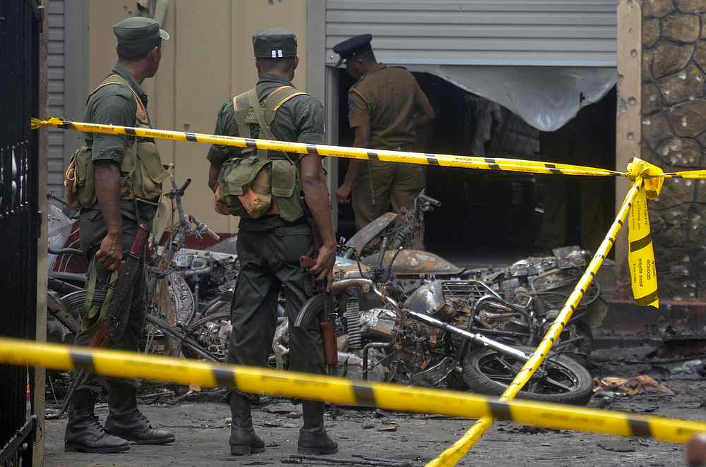 Sri Lankan military stand guard near the explosion site at a church in Batticaloa, Sri Lanka April 21, 2019.  u00e2u20acu201d Reuters pic