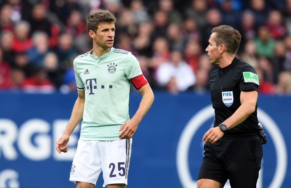 Bayern Munichu00e2u20acu2122s German forward Thomas Mueller (left) speaks with referee Tobias Stieler (right) during the Bundesliga match Nuremberg v FC Bayern Munich, April 28, 2019 in Nuremberg, Germany. u00e2u20acu201d AFP pic