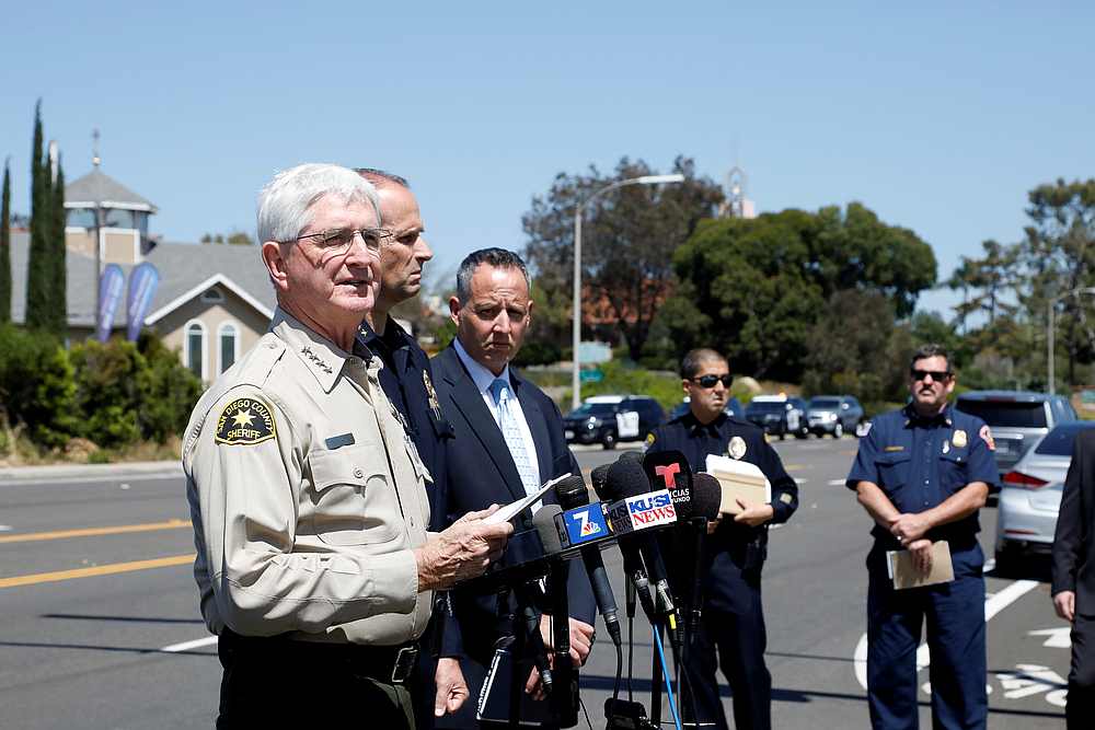 San Diego County Sheriff Bill Gore (left) speaks at a news conference at the scene of a shooting incident at the Congregation Chabad synagogue in Poway, north of San Diego, California April 27, 2019. u00e2u20acu201d Reuters pic