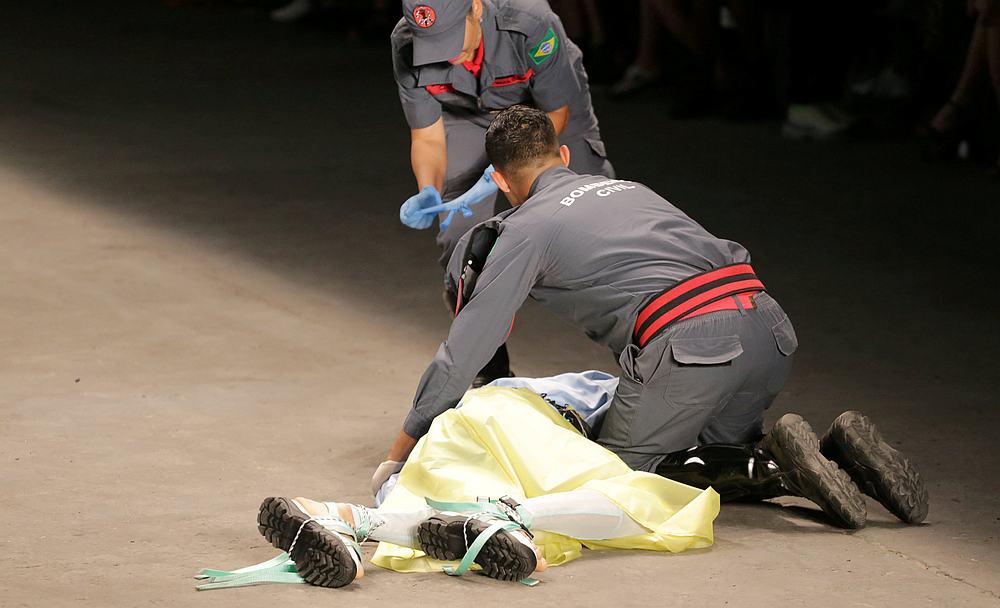 Paramedics are seen near Brazilian model Tales Cotta, 26, after he died on the catwalk during the Sao Paulo Fashion Week April 27, 2019. u00e2u20acu201d Reuters pic