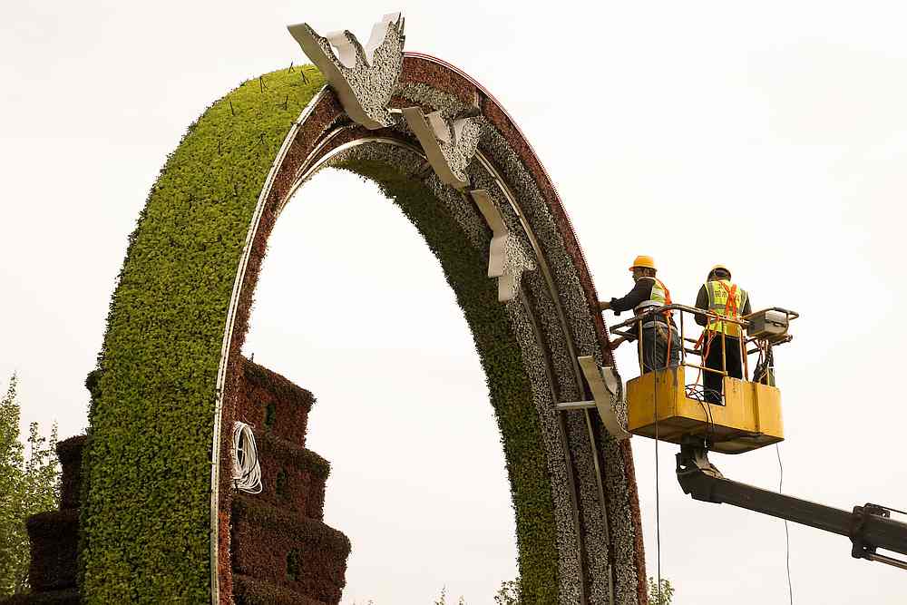 Workers set up a flower arrangement marking the upcoming Belt and Road Forum in Beijing, China April 19, 2019. u00e2u20acu201d Reuters pic