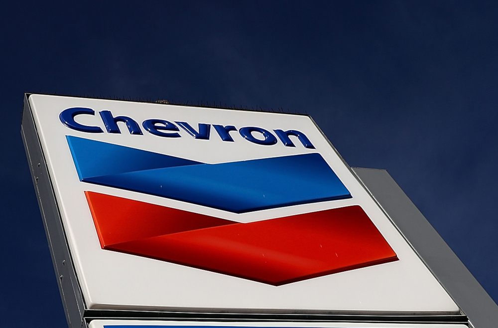 In this file photo taken February 2, 2018, a sign is posted in front of a Chevron gas station in Mill Valley, California. u00e2u20acu201d Justin Sullivan/Getty Images North America via AFP pic 