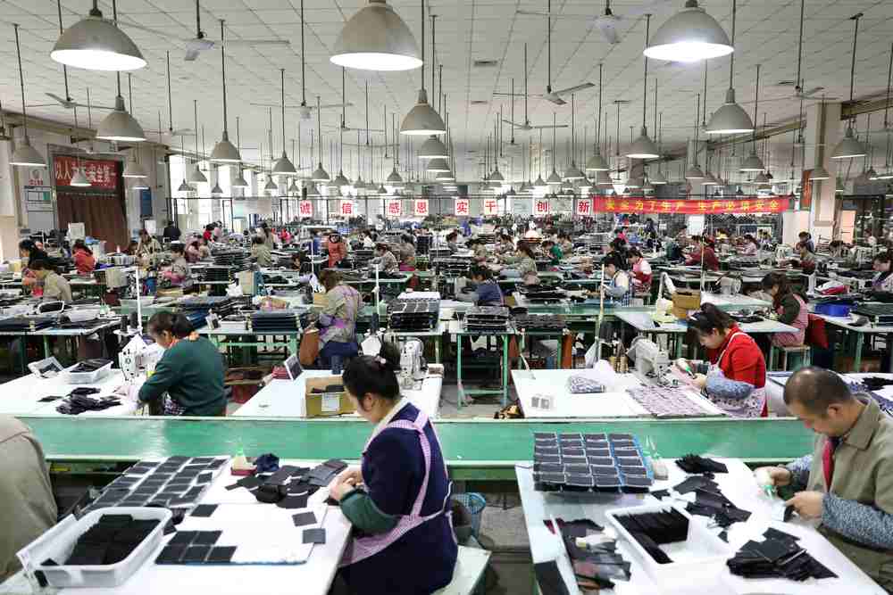 Employees work on the production line of a factory manufacturing fashion accessories in Sihong county, Jiangsu province, China March 27, 2019. u00e2u20acu201d Reuters pic