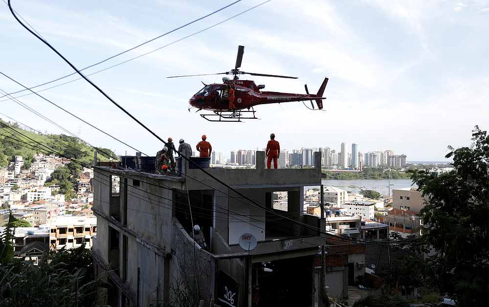 A person on a stretcher is transported on a helicopter after a building collapsed in Muzema community, Rio de Janeiro, Brazil April 12, 2019. u00e2u20acu201d Reuters pic 