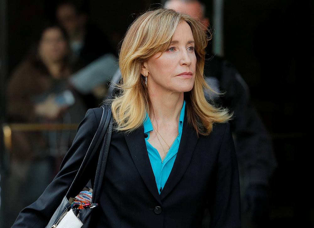 Actress Felicity Huffman leaves federal court in Boston, Massachusetts April 3, 2019. u00e2u20acu201d Reuters pic