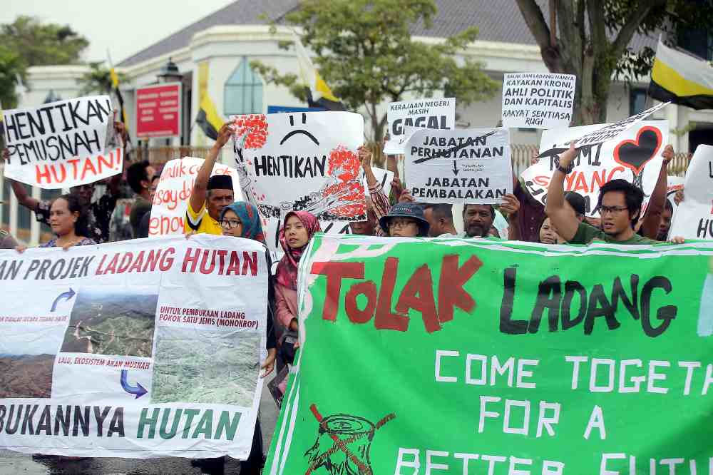 Around 100 Orang Asli from various villages gathered peacefully to protest deforestation and farming projects in Perak forest reserves, April 30, 2019. u00e2u20acu2022 Picture by Farhan Najib