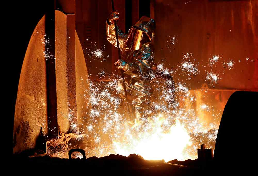 A steel worker of Germany's industrial conglomerate ThyssenKrupp AG takes a sample of raw iron from a blast furnace at Germany's largest steel factory in Duisburg January 28, 2019. u00e2u20acu201d Reuters pic