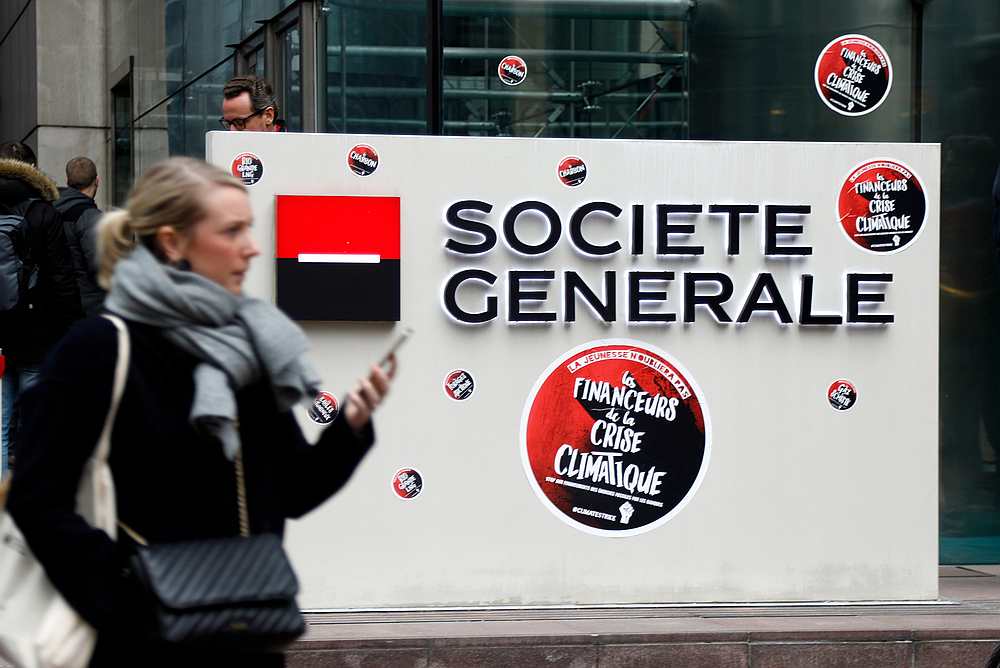 Logo of the French bank Societe Generale headquarters is surrounded by stickers, as part of a 'youth strike to act on climate change' nationwide school protest, at Puteaux near Paris March 15, 2019. u00e2u20acu201d Reuters pic