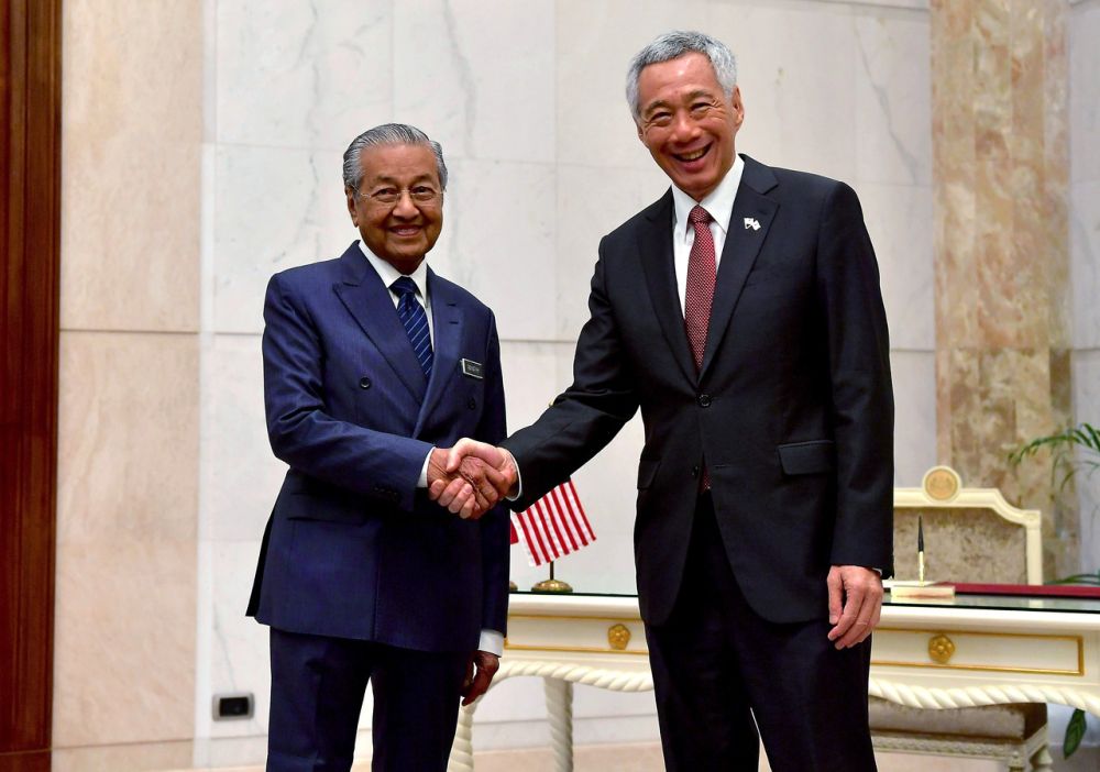 Prime Minister Tun Dr Mahathir Mohamad and Singaporean Prime Minister Lee Hsien Loong shake hands during a bilateral meeting at Putrajaya April 9, 2019. u00e2u20acu201d Bernama