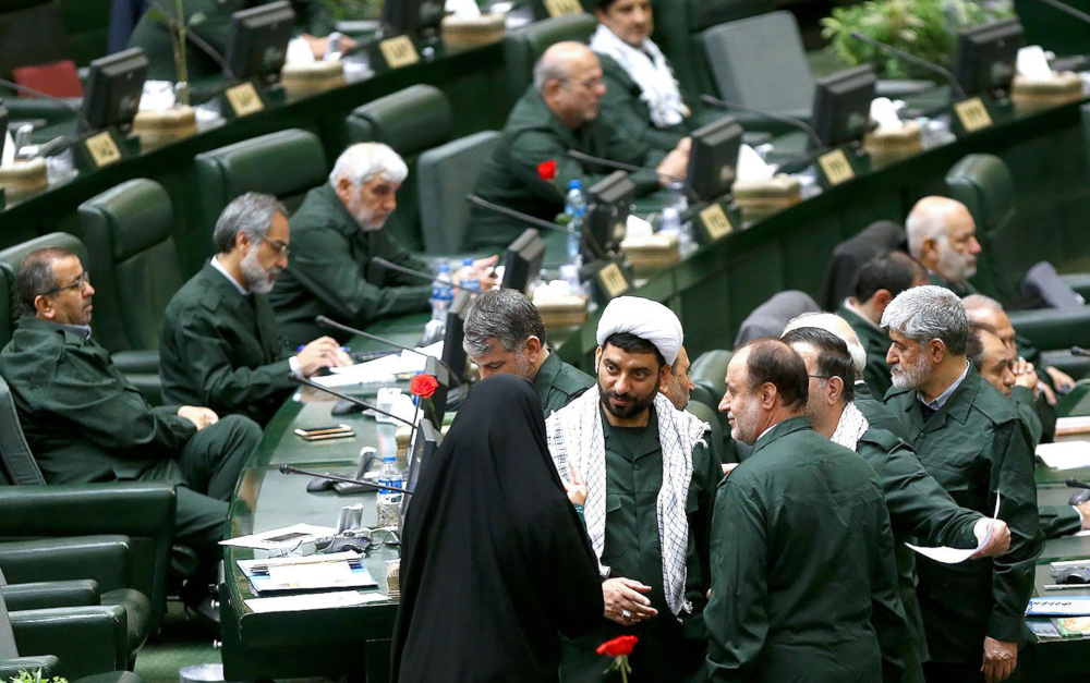 Iranian MPs wearing the outfit of the Islamic Revolutionary Guards Corp (IRGC) during a parliamentary session at the Islamic Consultative Assembly in Tehran April 9 2019. u00e2u20acu201d AFP pic 