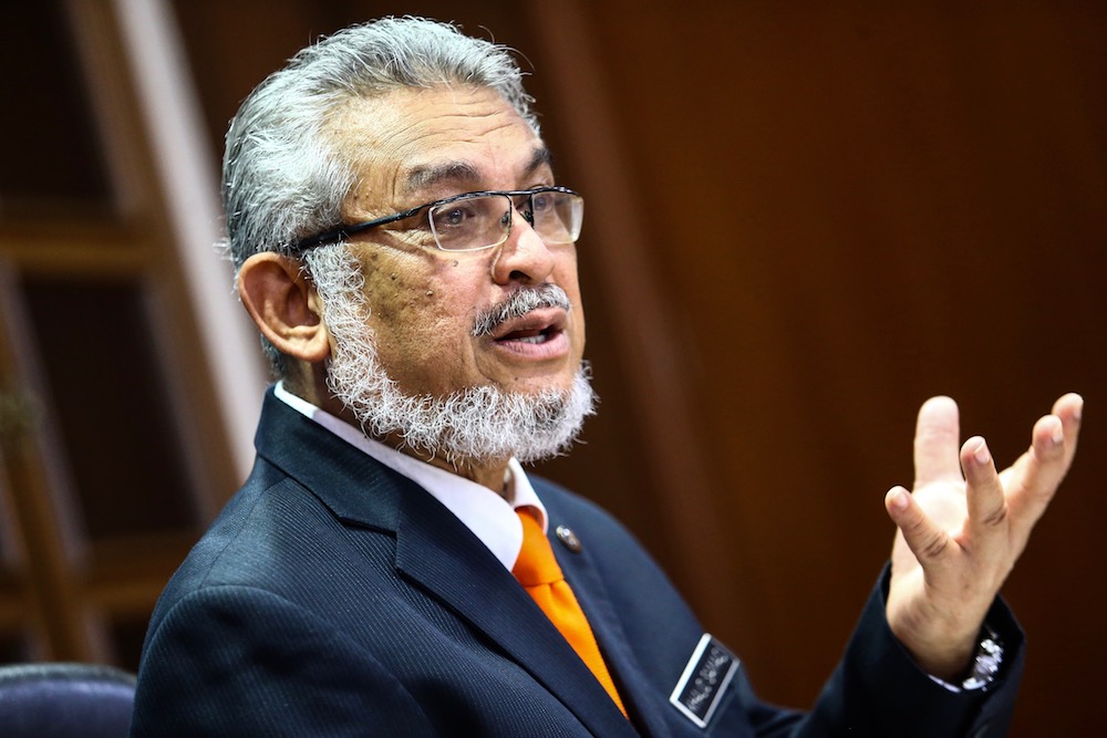 Federal Territories Minister Khalid Samad speaks to reporters in Putrajaya April 22, 2019. u00e2u20acu201d Picture by Hari Anggara
