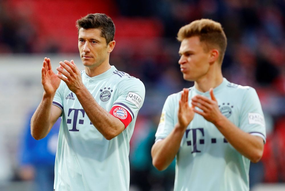 Bayern Munich's Robert Lewandowski and Joshua Kimmich look dejected after the match against Nuremberg. u00e2u20acu201d Reuters pic