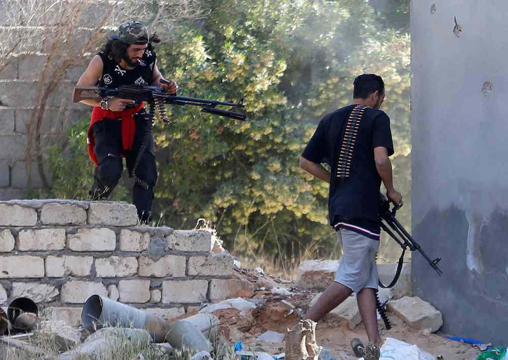 Members of the Libyan internationally recognised government forces fire during a fight with Eastern forces in Ain Zara, Tripoli April 28, 2019. u00e2u20acu201d Reuters pic