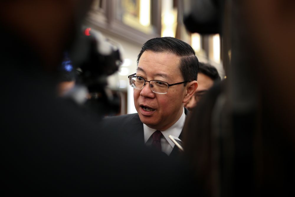 Finance Minister Lim Guan Eng speaks to reporters at the Parliament lobby April 2, 2019. u00e2u20acu201d Picture by Ahmad Zamzahuri