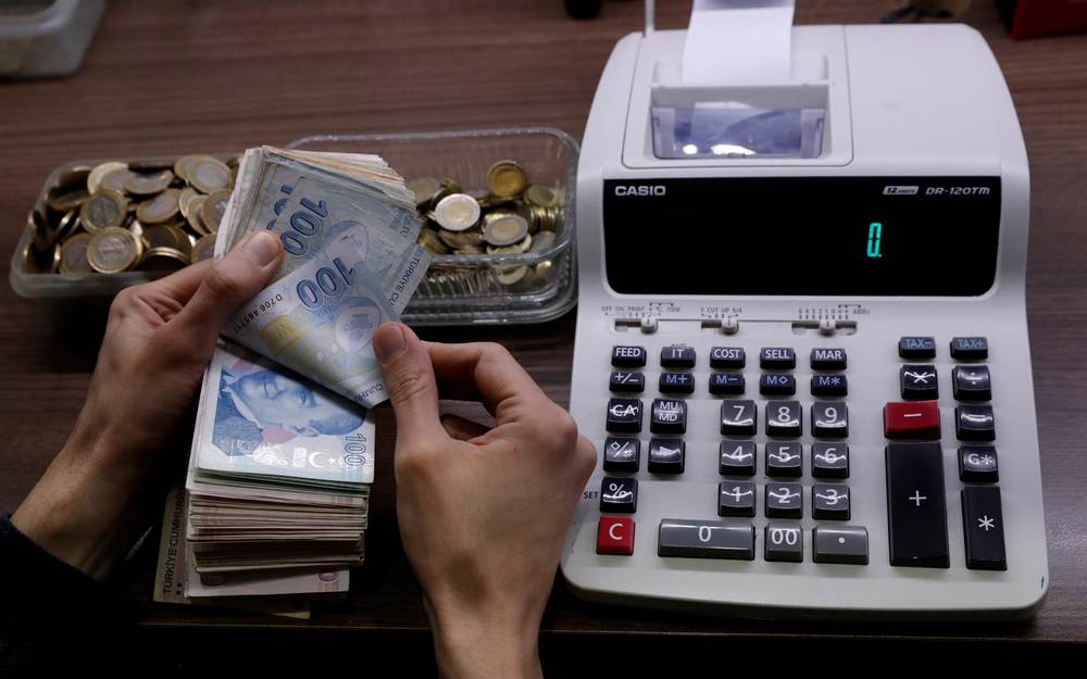 A merchant counts Turkish lira banknotes at the Grand Bazaar in Istanbul, Turkey March 29, 2019. u00e2u20acu201d Reuters pic