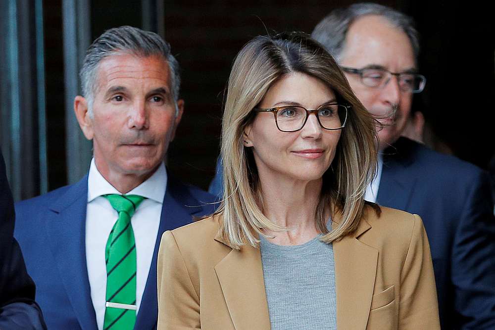Actor Lori Loughlin, and her husband, fashion designer Mossimo Giannulli, leave the federal courthouse in Boston, Massachusetts April 3, 2019. u00e2u20acu201d Reuters pic