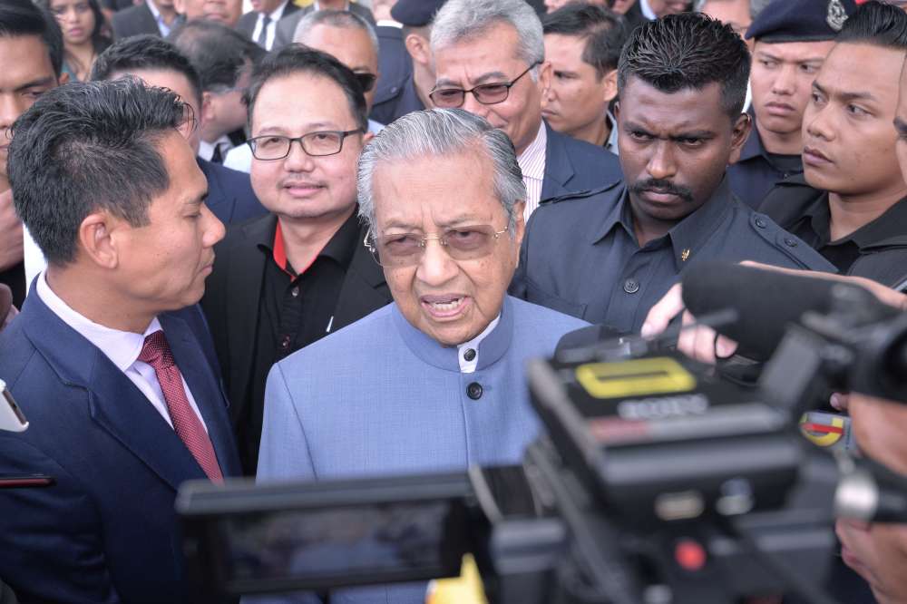 Tun Dr Mahathir Mohamad speaks to reporters after the launch of the Malaysia Autoshow 2019 in Serdang April 11, 2019. u00e2u20acu2022 Picture by Shafwan Zaidon